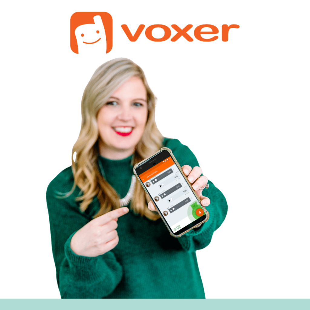 Jamie Trull smiling and pointing to a smartphone screen displaying the Voxer app. This image highlights one of the Jamie Trull DCA Bonus offers—direct voice messaging support via Voxer for students of Digital Course Academy who sign up using her link.