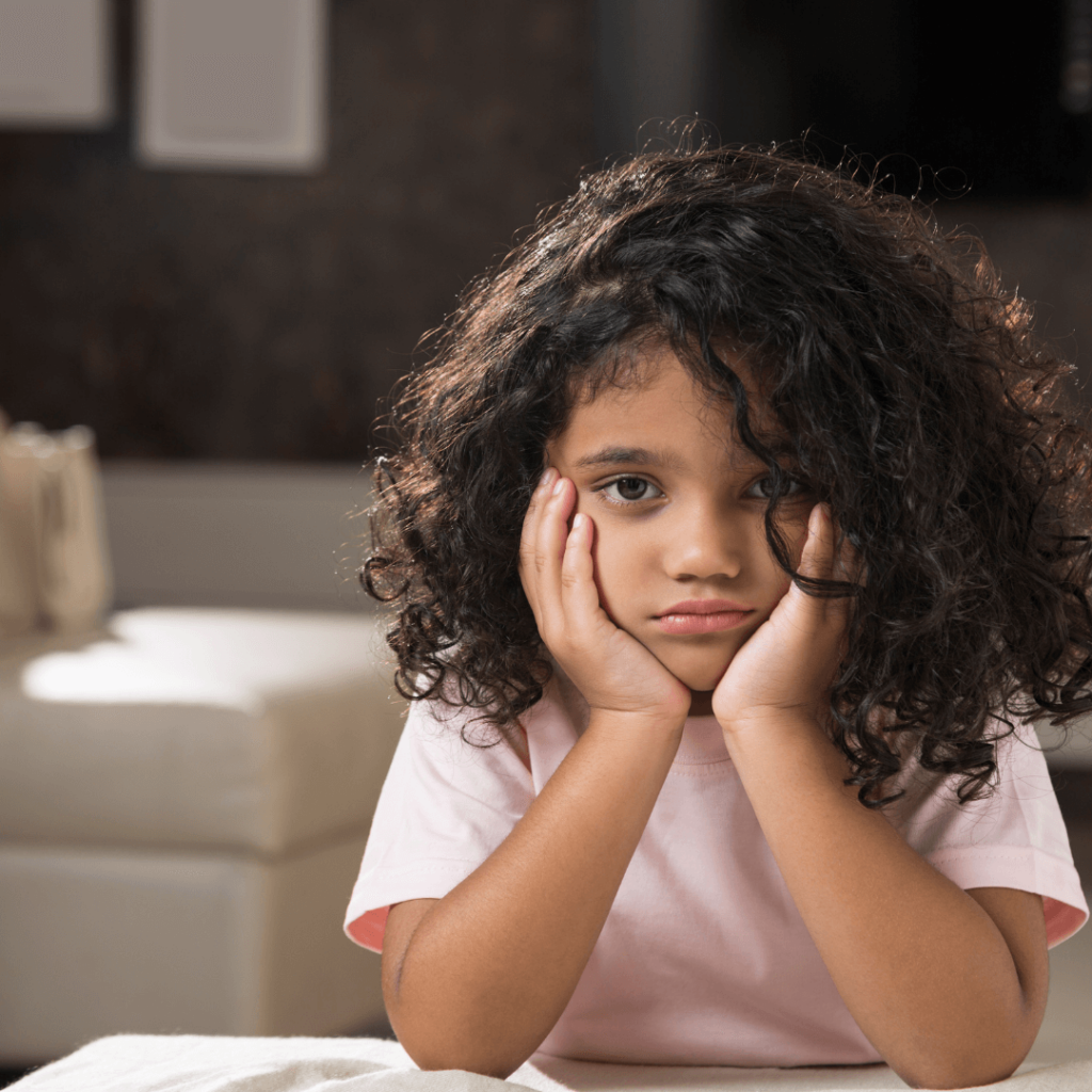 when it comes to hiring your child, it's important to remember that your role as parent comes first. Picture is of a cute kid that is maybe old enough to work looking sad because of this myth.
