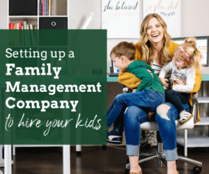 Setting up a family management company, how to hire your kids. Jamie Trull smiles while her children sit on her lap in her office.