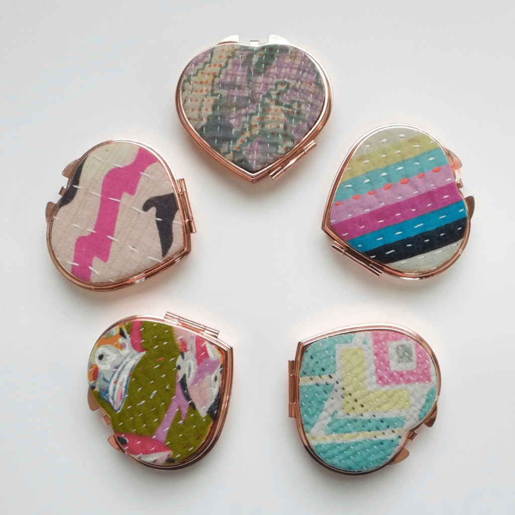 These jewelry or pill box containers are repurposed from fabric scraps for sustainability.