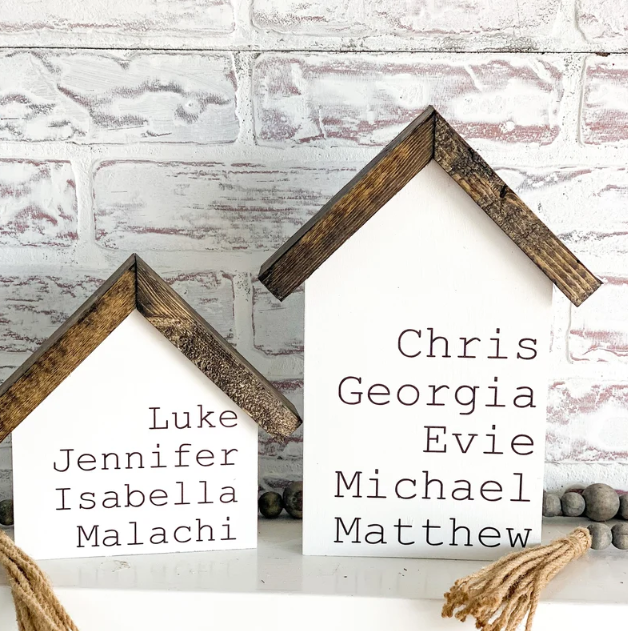 If your recipient loves rustic or country charm, these wooden house signs with the names of family member will delight them!