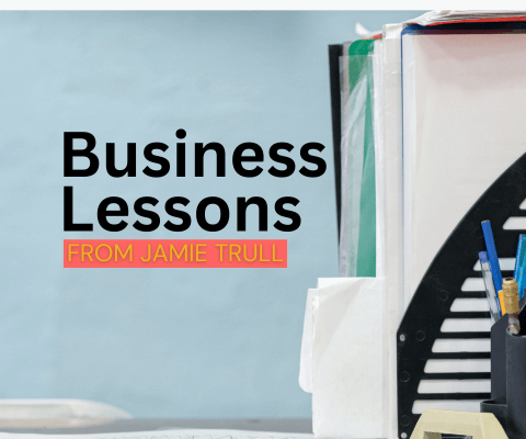 Office supplies on a desktop with text overlay: business lessons from Jamie Trull.