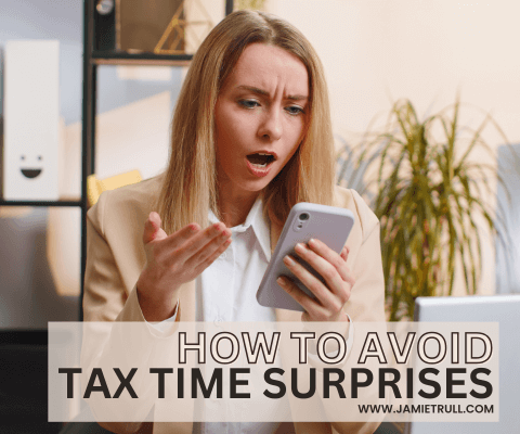 A frustrated young woman with blonde hair, wearing a beige blazer and white shirt, holding a smartphone to illustrate the importance to make estimated tax payments. And gesturing in confusion while sitting in a modern office, possibly because she did not make quarterly payments like Jamie Trull recommends! The text overlay reads 'How to Avoid Tax Time Surprises' with a website link to JamieTrull.com.