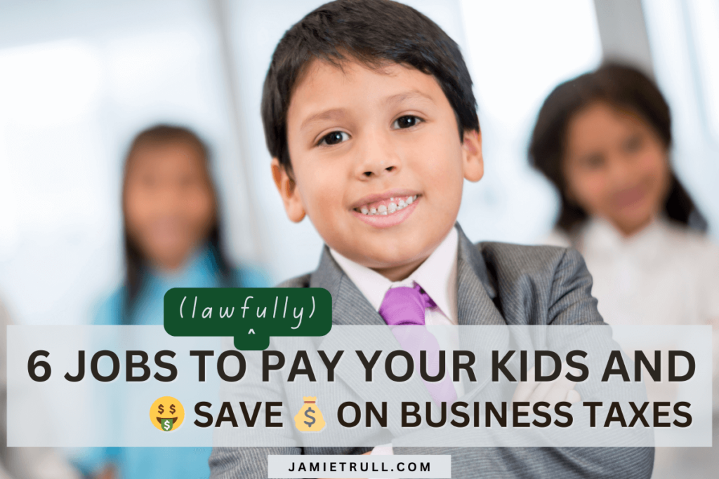 A smiling young boy in a suit stands confidently with arms crossed, surrounded by other children in a classroom setting. The headline reads '(Lawfully) 6 Jobs to Pay Your Kids and Save on Business Taxes,' with dollar icons and the website jamietrull.com.