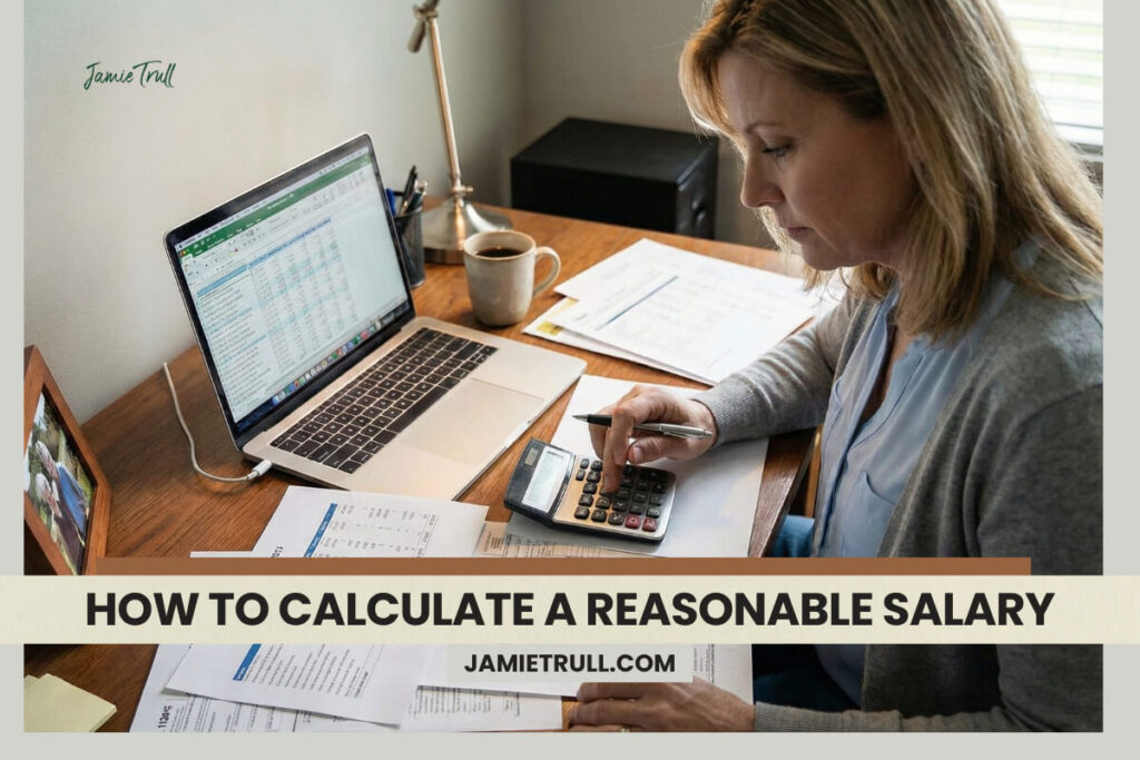 Small business owner performing a reasonable compensation analysis for an S corporation, calculating an S corp reasonable salary at a desk with financial documents.